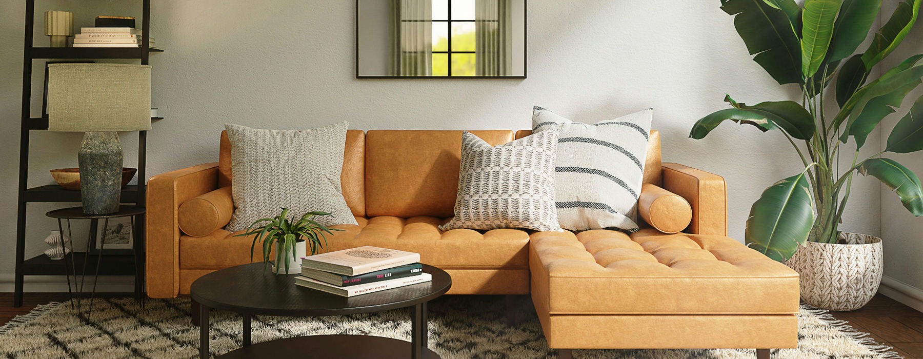 room with couch with pillows on it